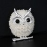 Crystal brooch with pearl owlBrooches