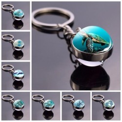 Blue sea life - round double sided glass keychain - turtle / dolphin / seashells
