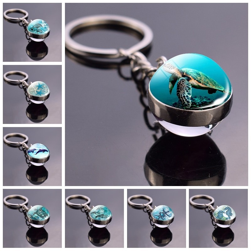 Blue sea life - round double sided glass keychain - turtle / dolphin / seashellsKeyrings