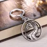 Round metal keychain with dragonKeyrings