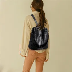 Eleganter Lederrucksack - multifunktionale Umhängetasche