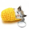 Sleeping cat in a hand-woven cot - keychainKeyrings