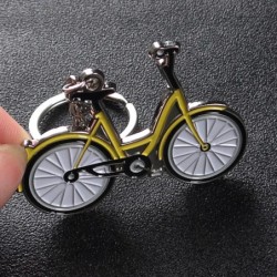 Yellow bicycle - metal keychain