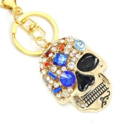 Golden keychain with crystal skullKeyrings