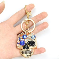 Golden keychain with crystal skullKeyrings