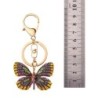 Goldener Schlüsselanhänger mit einem Kristallschmetterling