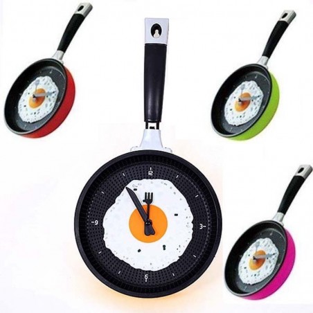 Metal wall clock in the shape of a frying pan with a fried eggClocks