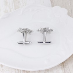 Silver cufflinks with snowflake and Christmas treeCufflinks